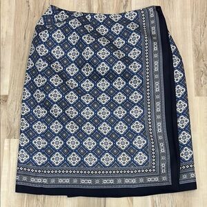 Talbot, petite Blue and White Patterned silk. Button on the side. Skirt size 4